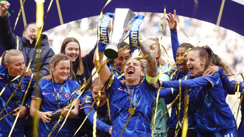 Millie Bright lifts the Women's League Cup after Chelsea beat Manchester City in Derby. 