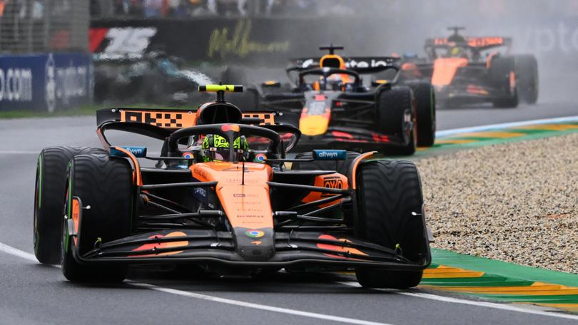 MELBOURNE, AUSTRALIA - MARCH 16: Lando Norris of Great Britain driving the (4) McLaren MCL39 Mercedes leads Max Verstappen of the Netherlands driving the (1) Oracle Red Bull Racing RB21 and Oscar Piastri of Australia driving the (81) McLaren MCL39 Mercedes during the F1 Grand Prix of Australia at Albert Park Grand Prix Circuit on March 16, 2025 in Melbourne, Australia. (Photo by Clive Mason/Getty Images)