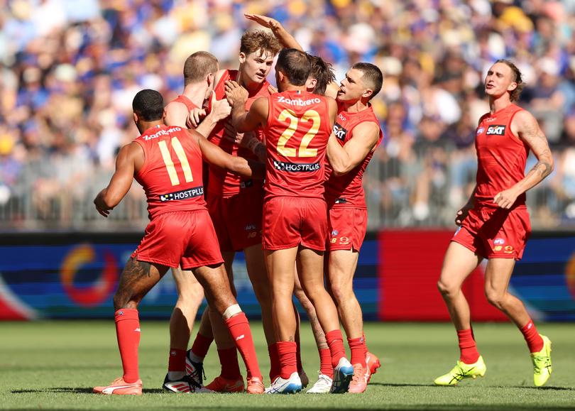 PERTH, AUSTRALIA - MARCH 16: Ethan Read of the Suns celebrates a goal during the 2025 AFL Round 01 match between the West Coast Eagles and the Gold Coast Suns at Optus Stadium on March 16, 2025 in Perth, Australia. (Photo by Janelle St Pierre/AFL Photos via Getty Images)