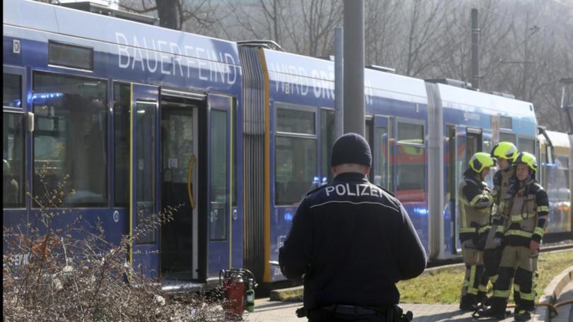 A woman was doused in liquid and set on fire on a tram in eastern Germany.