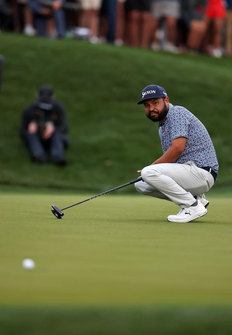 JJ Spaun  reacts as his birdie putt on the 18th green stops just short of the hole during the final round.