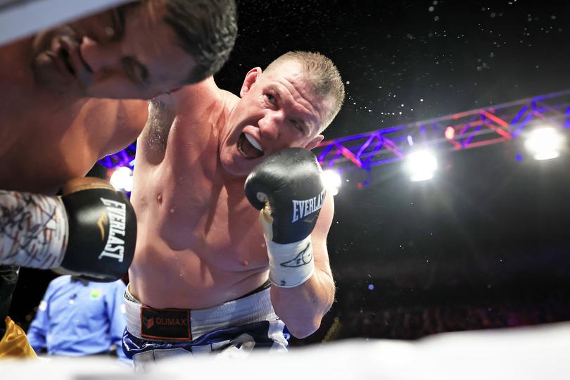 Paul Gallen throws a punch during the Paul Gallen and Justin Hodges fight in 2022.