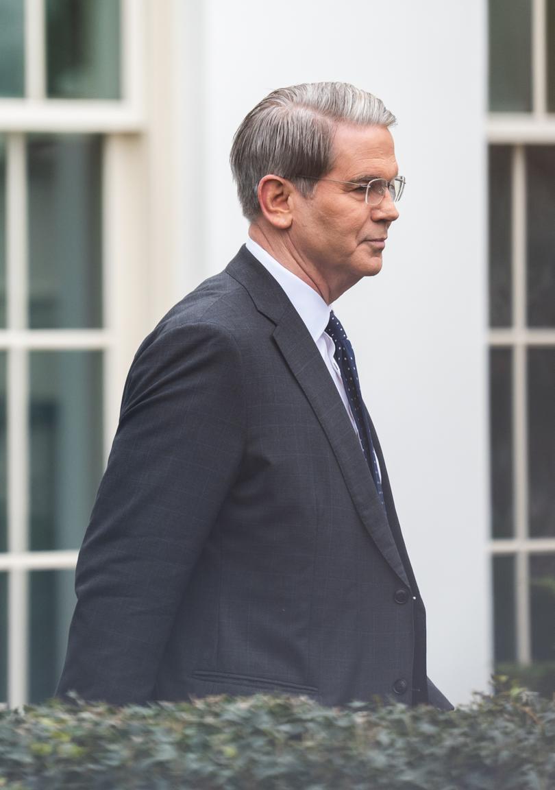 Treasury Secretary Scott Bessent leaves the White House on March 14. 