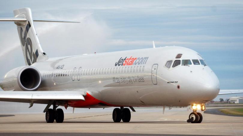 A boy has faced court accused of breaking through a fence and taking a shotgun onto a Jetstar plane.