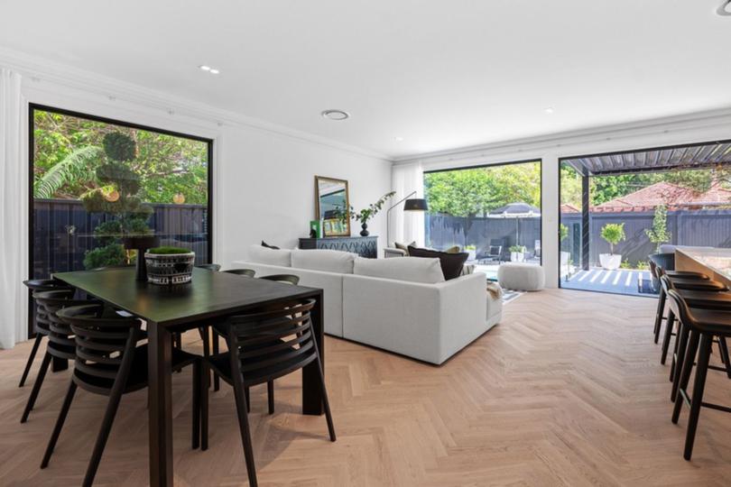 The open-plan living, dining and kitchen area.