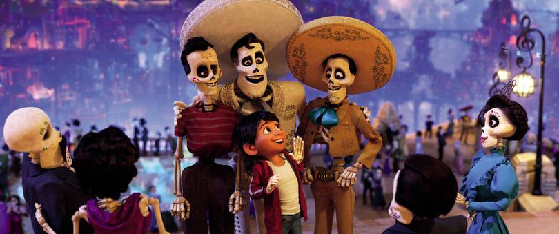 In a scene from Disney Pixar's animated film Coco, aspiring musician Miguel (voiced by Anthony Gonzalez) journeys through the Land of the Dead in search of his idol Ernesto de la Cruz (centre, Benjamin Bratt). 