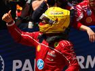 Sprint winner Lewis Hamilton celebrates in parc ferme after his first win for Ferrari.