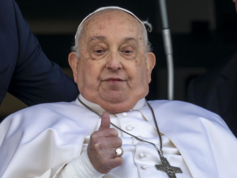 Pope Francis appeared at a window of the Agostino Gemelli Polyclinic in Rome as he was discharged. (AP PHOTO)