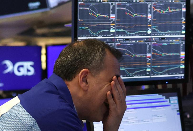 A trader works on the floor of the New York Stock Exchange (NYSE) in New York City, on April 4, 2025.