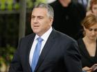 MELBOURNE, AUSTRALIA - MARCH 27:  Joe Hockey,  the Treasurer of Australia in the Abbott Government arrives at Scots Church during the State Funeral for the Right Honourable Malcolm Fraser on March 27, 2015 in Melbourne, Australia.  Malcolm Fraser was the 22nd Prime Minister of Australia and the Leader of the Liberal Party from 1975 to 1983. On 20 March 2015, Fraser died at the age of 84.  (Photo by Scott Barbour/Getty Images)