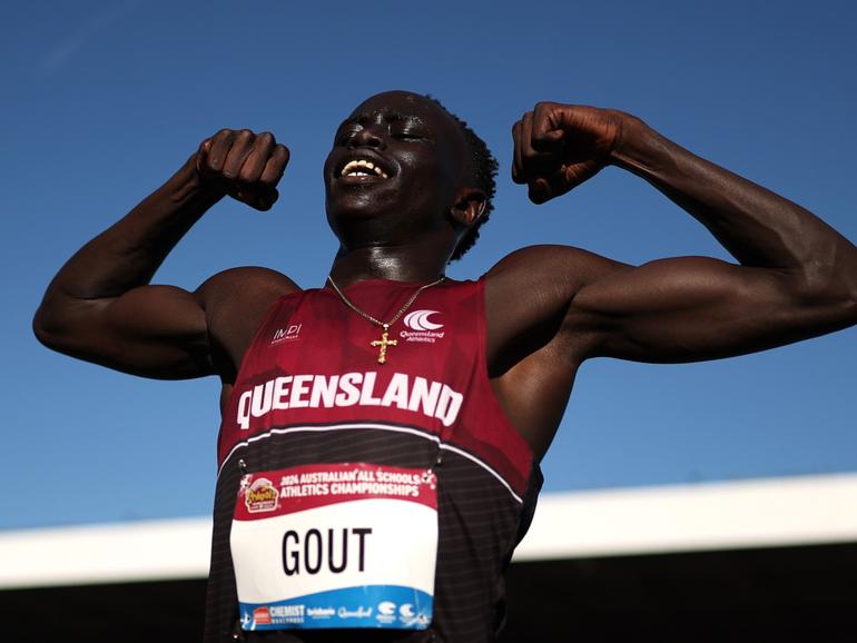 Gout Gout of Queensland celebrates winning the Boys' U18 200m Final.