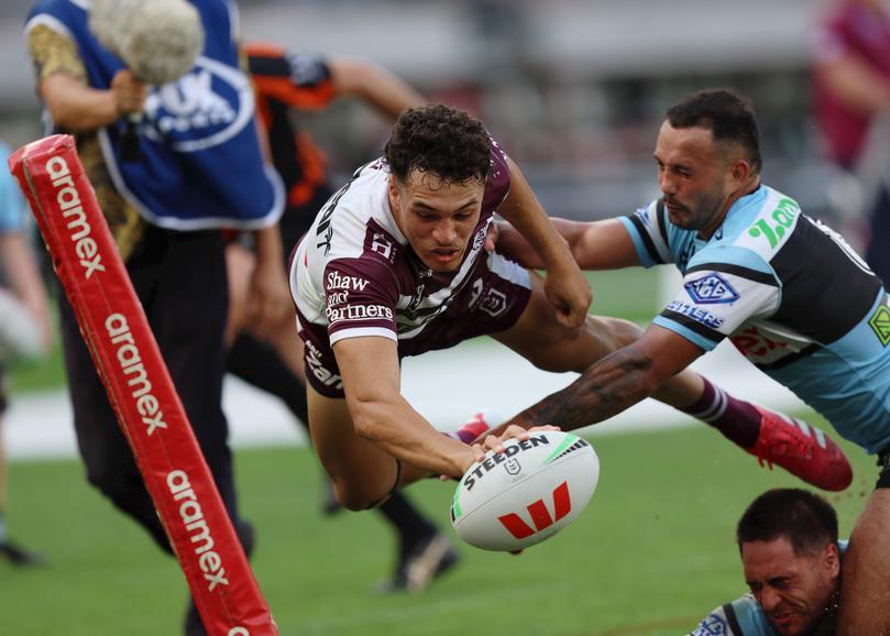 Clayton Faulao of the Sea Eagles dives for the line.