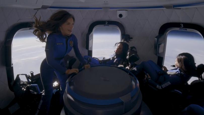 Lauren Sanchez gets weightless as the Blue Origin craft passes the Karman line.