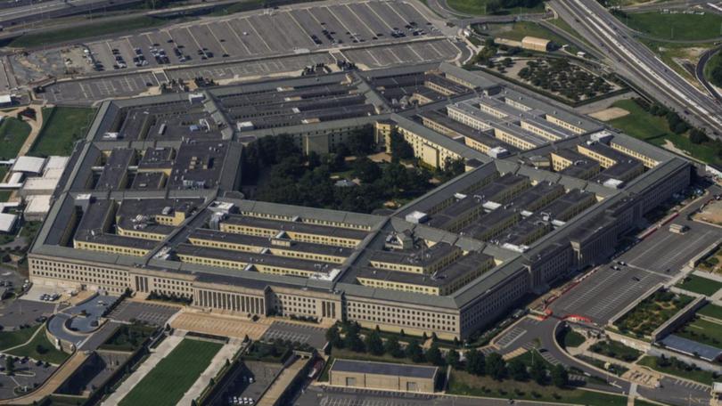 Ousted officials claim Pentagon officials slandered their characters with baseless attacks. (AP PHOTO)