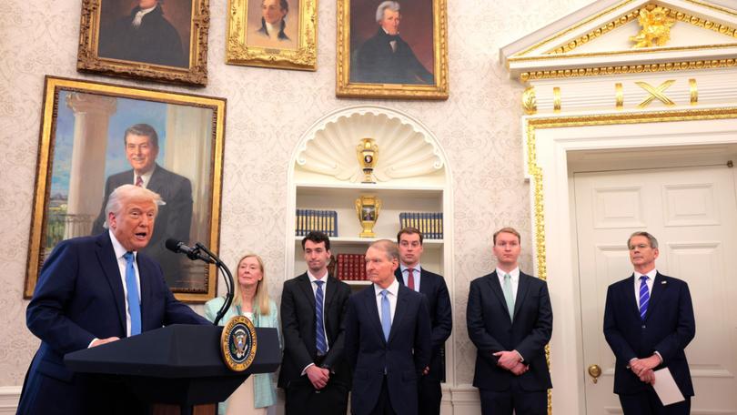  Trump delivers remarks during the swearing in ceremony for SEC Chairman Paul Atkins (centre alongside family) and and Treasury Secretary Scott Bessent (far right) in the Oval Office at the White House on April 22.  