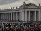 Faithful join a long line into St Peter's Square to view the body of Pope Francis laying in state inside St Peter's Basilica.