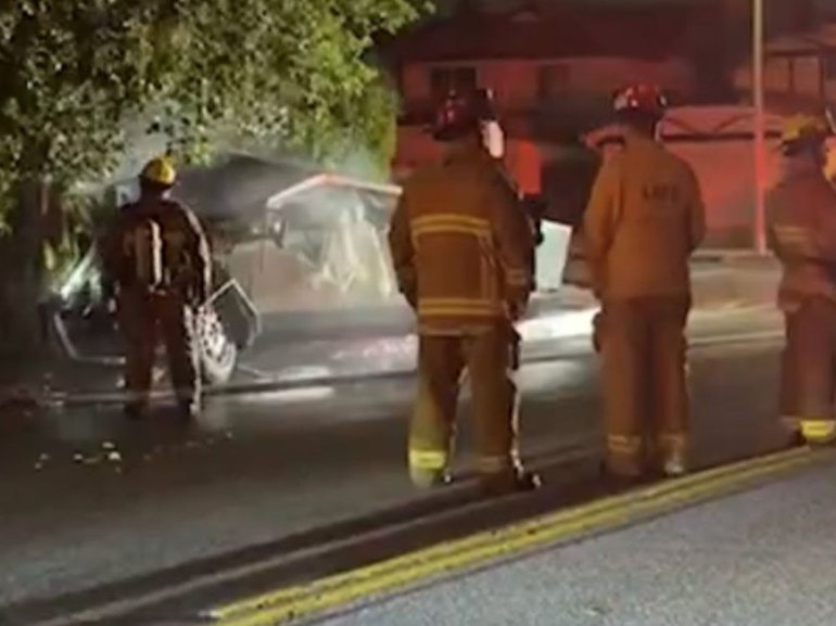 Alijah Arenas’ Cybertruck caught on fire after he hit a tree.