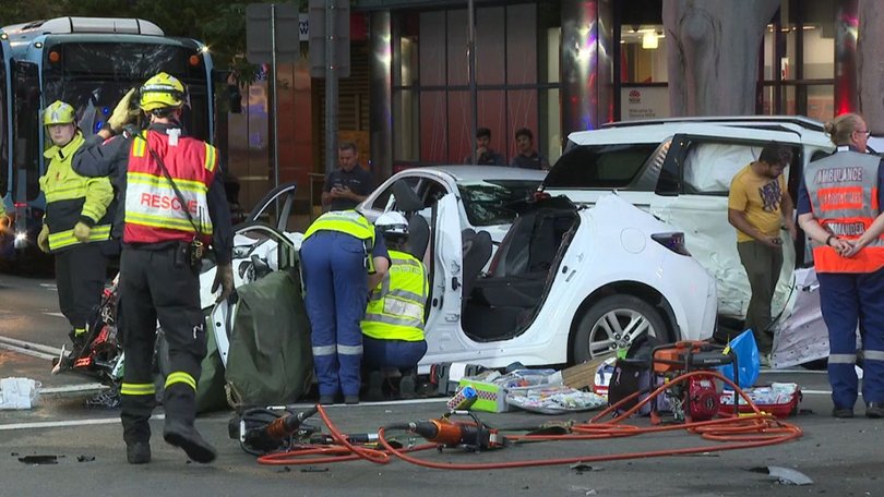 One seriously injured woman was trapped inside her car.