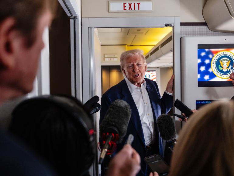 President Donald Trump speaks with reporters as he travels to the funeral of Pope Francis aboard Air Force One, April 25, 2025. In response to a White House proposal to end the war in Ukraine that critics say would grant the Kremlin much of what it wants, UkraineÕs leadership has drafted a counteroffer they plan to deliver to TrumpÕs team. (Eric Lee/The New York Times)