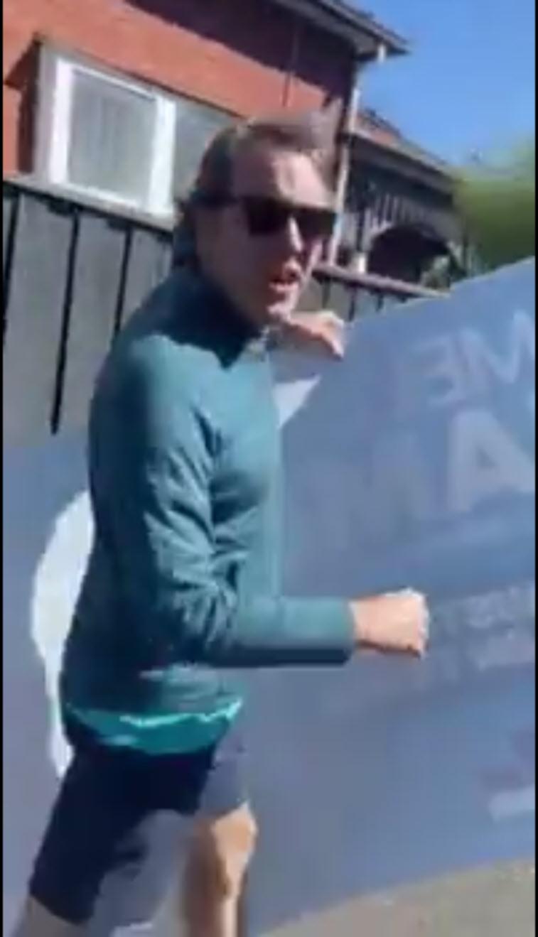 Teal tantrum. Monique Ryan’s husband stealing an Amelia Hamer poster from the nature strip of a residential property and running off with it.
