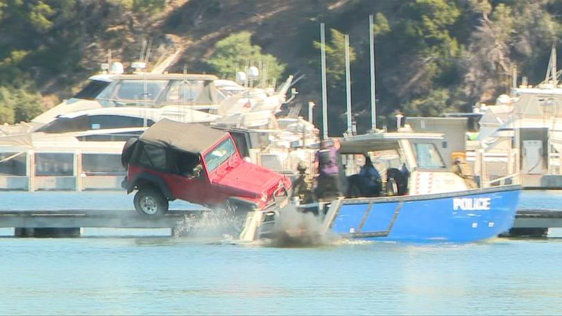 A man has been charged after a car was driven off a jetty in Claremont, Perth.