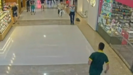 Hero police officer Amy Scott draws her gun during a stabbing attack at Westfield Bondi Junction.