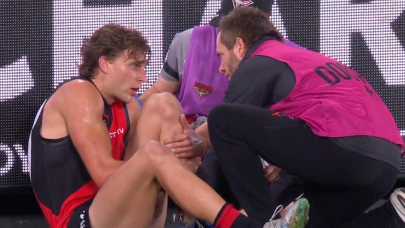 Harrison Jones received medical assistance on the boundary line.