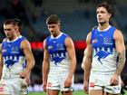Jy Simpkin of the Kangaroos looks dejected after losing a game they could have won.
