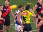 The AFL umpire changed his free kick decision after receiving ‘word’ from another umpire.