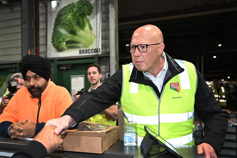 Opposition Leader Peter Dutton visits the South Australian Produce Market in the electorate of Makin on the last day of campaigning.