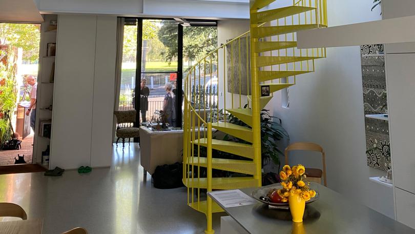 The bold yellow spiral staircase.