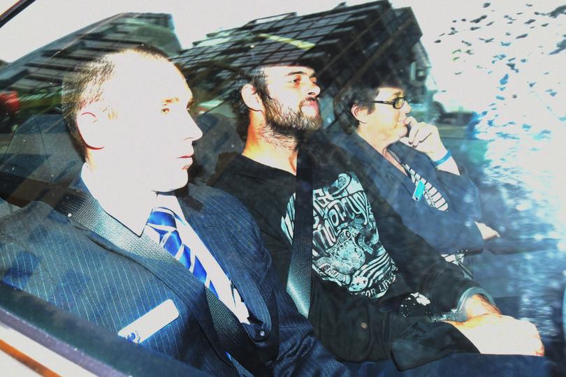 Marcus Stanford, centre, was convicted of being an accessory to the murder of Stephanie Scott.