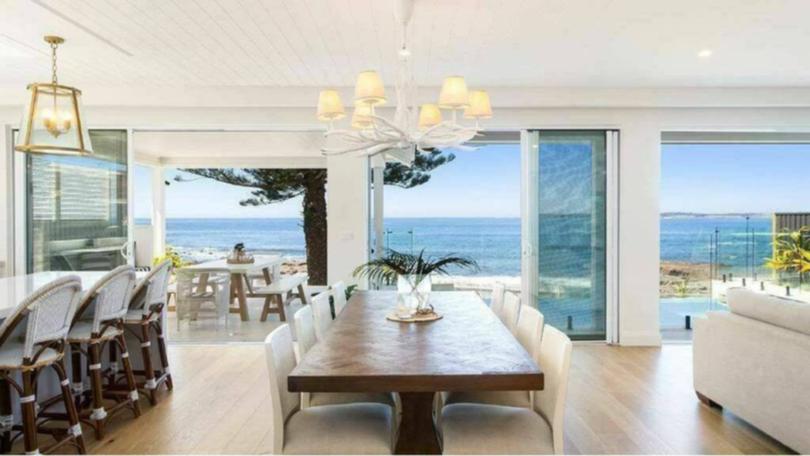 The five-bedroom, five-bathroom Hamptons style new-build, has a prime waterfront position along with plenty of high-end inclusions.