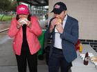 Resources Minister Madeleine King and Premier Roger Cook tuck into a bacon and eggs roll each after voting at Wellard Primary School this morning.