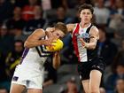 MELBOURNE, AUSTRALIA - MAY 02: Jeremy Sharp of the Dockers and Darcy Wilson of the Saints compete for the ball during the 2025 AFL Round 08 match between the St Kilda Saints and the Fremantle Dockers at Marvel Stadium on May 2, 2025 in Melbourne, Australia. (Photo by Michael Willson/AFL Photos via Getty Images)