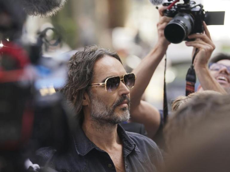 Russell Brand arrived at Westminster Magistrates' court in London to a mass of photographers. 