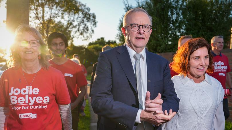 Anthony Albanese greets supporters with Labor's local candidate Jodie Belyea at a pre-polling booth in Carrum Downs, in the electorate of Dunkley, on May 02.