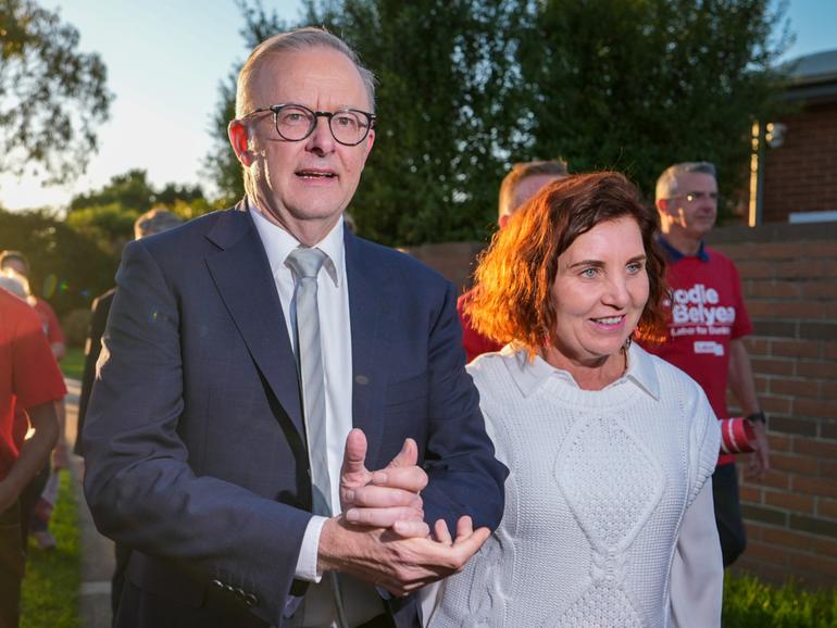 Anthony Albanese greets supporters with Labor's local candidate Jodie Belyea at a pre-polling booth in Carrum Downs, in the electorate of Dunkley, on May 02.