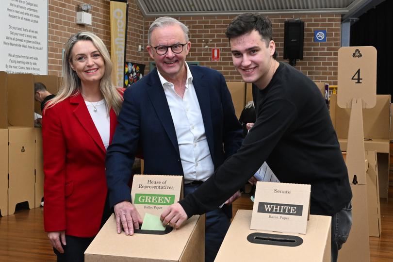 Australian Prime Minister Anthony Albanese, partner Jodie Haydon and son Nathan cast their votes at a polling booth at Marrickville West Public School in the electorate of Grayndler on Election Day of the 2025 federal election campaign, Sydney, Saturday, May 3, 2025. (AAP Image/Lukas Coch) NO ARCHIVING