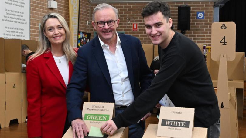 Anthony Albanese and his son Nathan cast their votes on home turf at a Sydney primary school. (Lukas Coch/AAP PHOTOS)