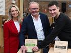 Anthony Albanese and his son Nathan cast their votes on home turf at a Sydney primary school. (Lukas Coch/AAP PHOTOS)