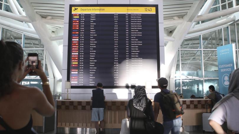 A power outage in Bali has resulted in long lines at airport check-in counters.