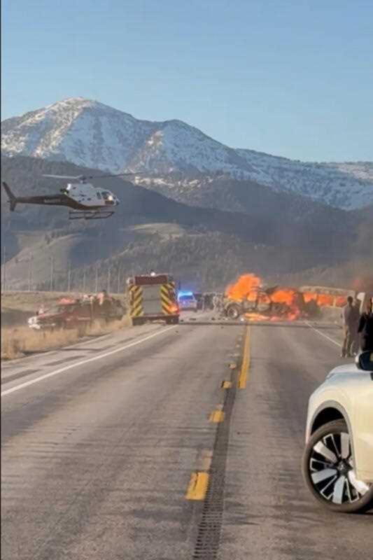 Rescue workers arrive to the scene after a deadly collision between a pickup truck and tour van near Henry’s Lake State Park in eastern Idaho on Thursday, May 1, 2025.