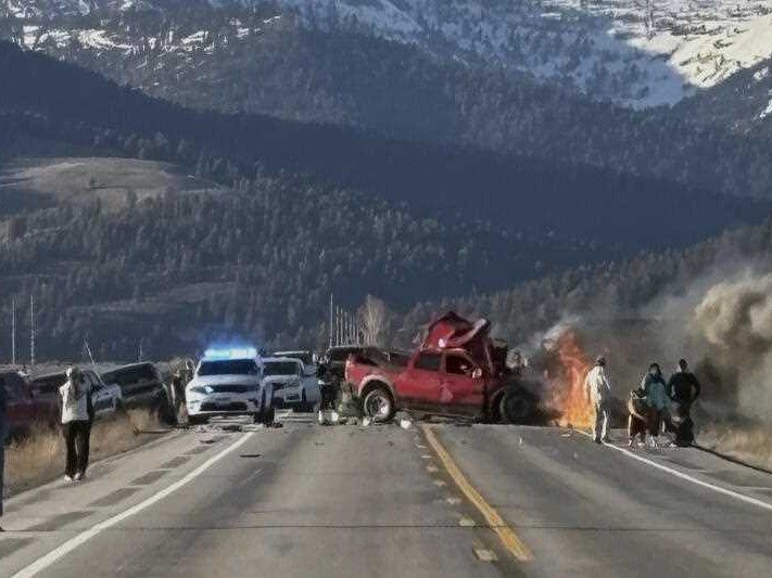 Rescue workers arrive to the scene after a deadly collision between a pickup truck and tour van near Henry’s Lake State Park in eastern Idaho on Thursday, May 1, 2025. 