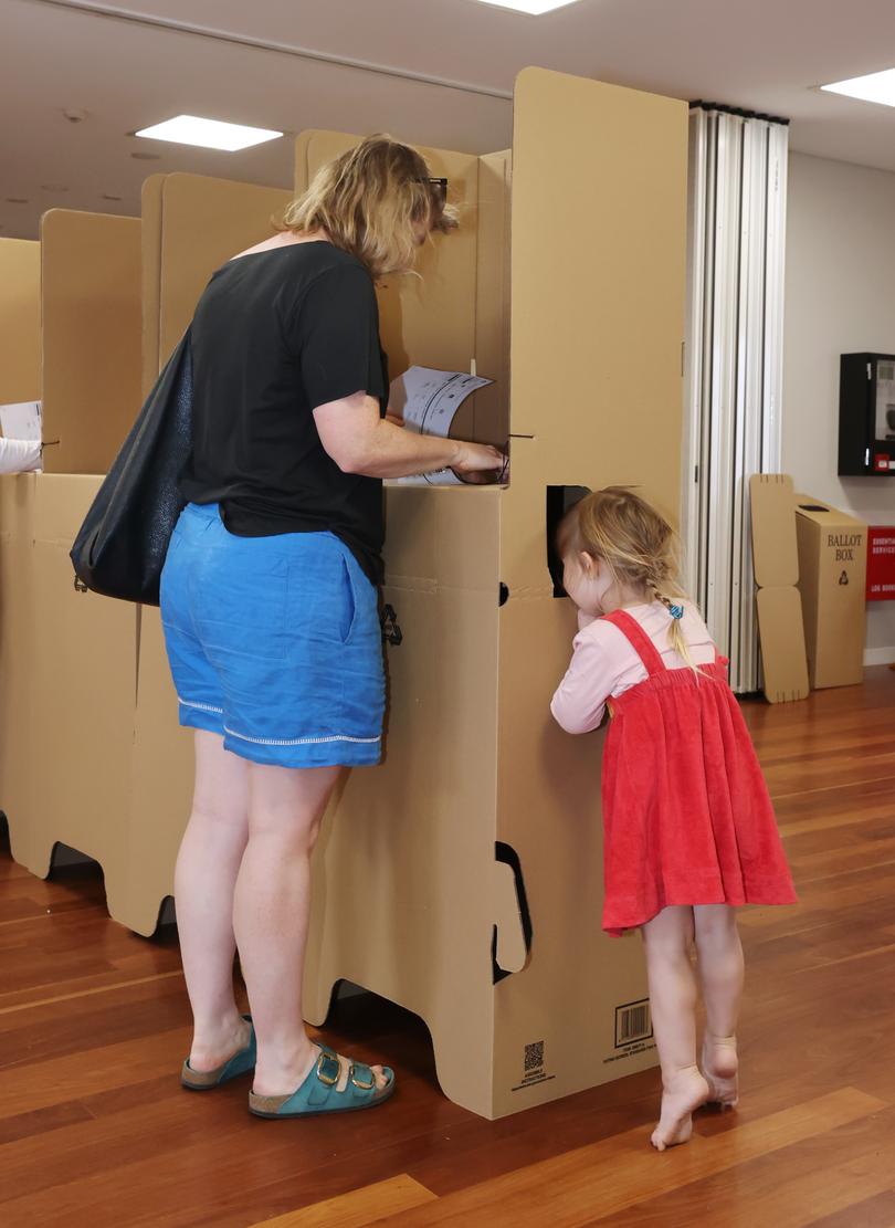 Voters voting at the Cottesloe Civic Centre polling booth. 
