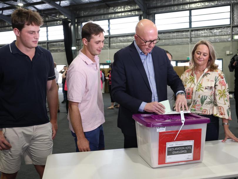 Mr Dutton cast his vote flanked by his family on Saturday.