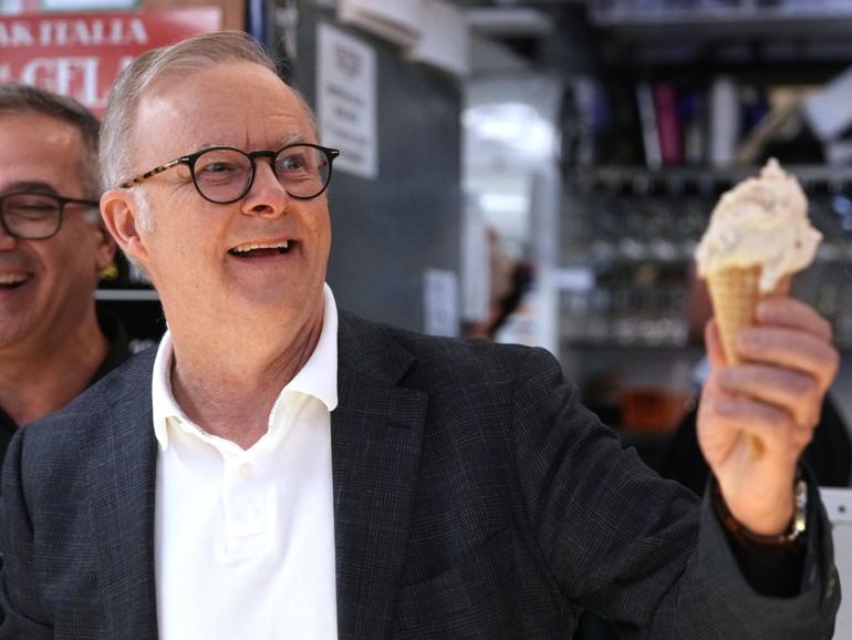 Prime Minister Anthony Albanese eats an ice cream today after his election win.