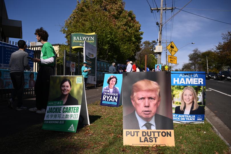 A campaign corflute depicting Leader of the Opposition Peter Dutton as US president Donald Trump at Balwyn Primary School in the electorate of Kooyong on election day.