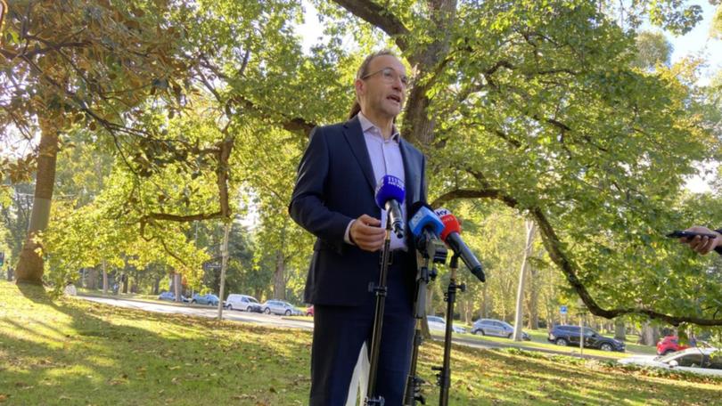Greens leader Adam Bandt says his scrutineers remain confident despite trailing in the vote count.