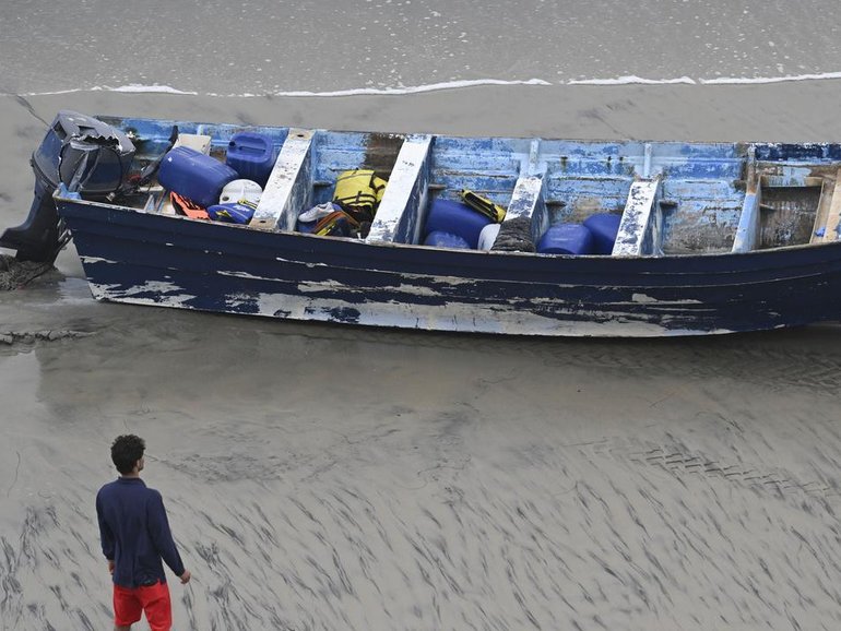 Four people were rescued after the "panga"-style open fishing vessel washed ashore near San Diego.